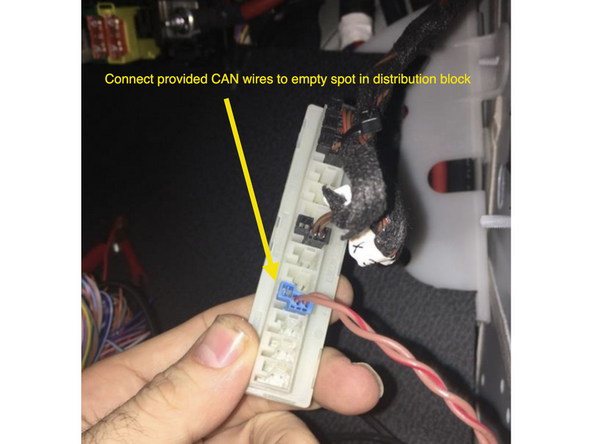 Locate CAN distribution block with OEM brown and brown/red wires above passenger kick panel