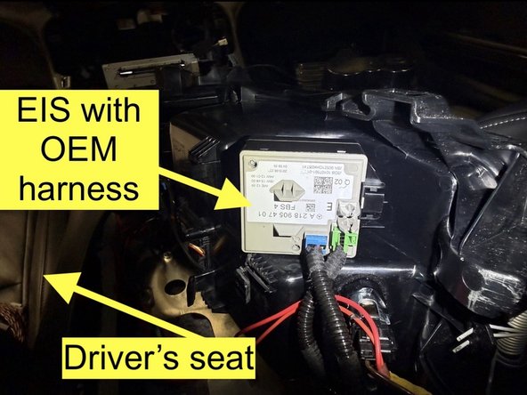 Access EIS module behind center console