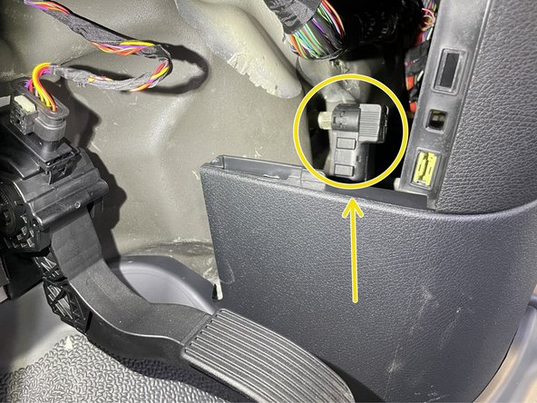 Locate battery quick disconnect cable behind access panel