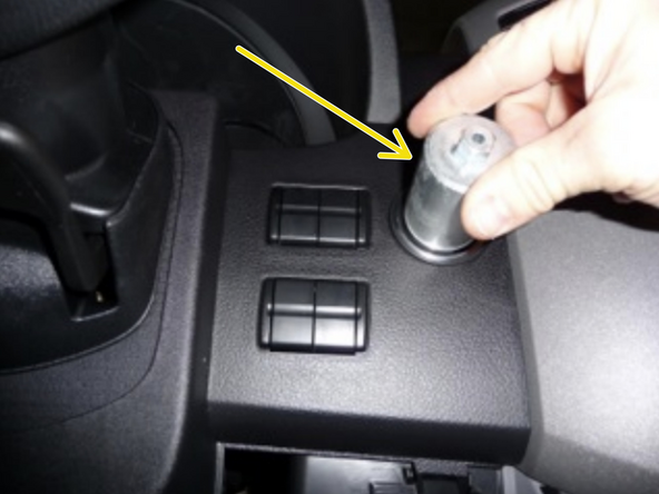 Using the EIS tool, unscrew the retaining ring for the ignition cylinder and set aside