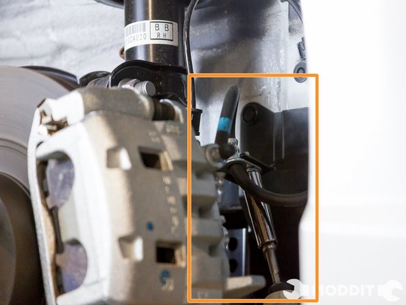 First you have to remove the brake line brackets with a 12mm socket or combination wrench.