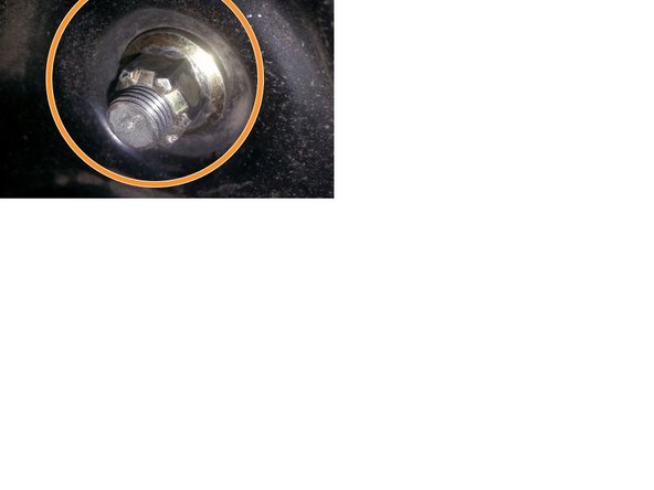 Unbolt rear subframe by using a 1/2&quot; drive ratchet (preferable) with 17mm deep socket to loosen the 4 nuts that hold the subframe in place (the use of air tools is allowable but not recommended).