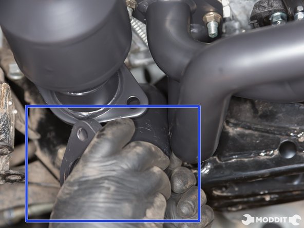 Once the header bolts are all torqued to spec, you can now install the over pipe to the header. (see over pipe install if you forgot how to do it)