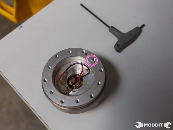 Remove the wheel from the quick release and set the wheel aside.