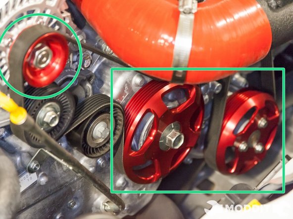 Install the belts in the order your removed them, making sure to leave the alternator belt last to slip over.