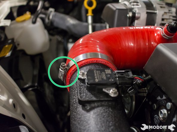 Adjust the Perrin tube with minimal tension on the hose and then tighten clamps.