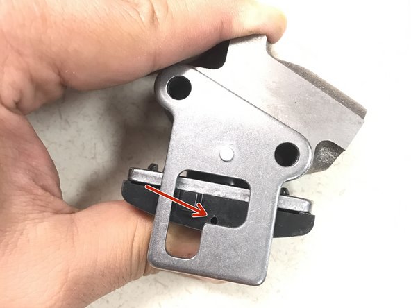 If you tensioner does not compress, you may need to remove the front cover and the tensioner. Once removed, the tensioner can be slowly compressed in a vice with the proper soft jaw to not damage the guide surface.