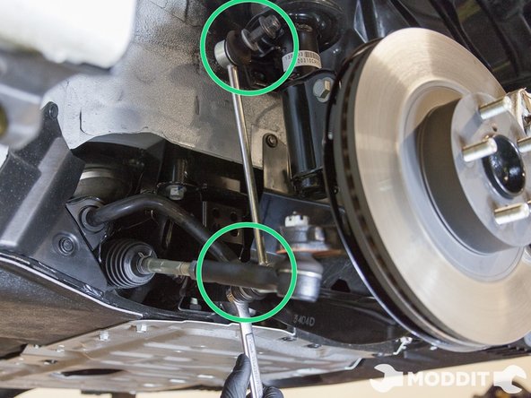 The last small component to remove on the front oem suspension are the sway bar end links. Use a 14mm socket on the nut side and an Allen wrench on the bolt to remove the end links. If you don’t have replacement sway bar end links, then leave the end links on.