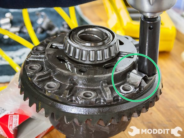 The one item  you will have to swap over, unless you're converting your drive ratio, is the LSD Ring. It doesn't matter what order you do this or the bearing.