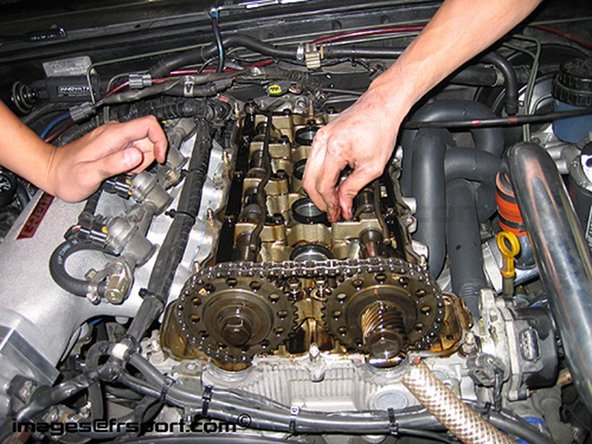 Figure 1- Remove the timing chain tensioner then remove the cam sprocket bolts that you loosened earlier.