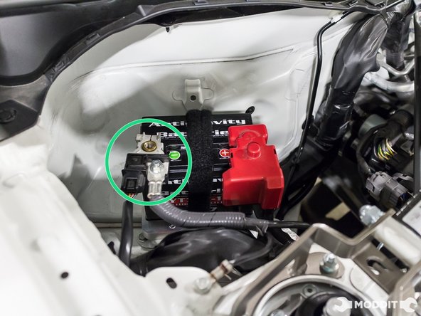 Disconnect the battery. (picture shown is the DIF Super lightweight Battery Tray)