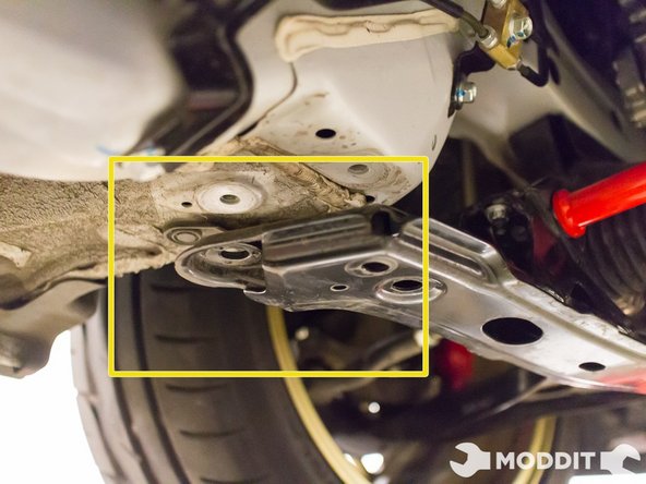 Beginning with the front-most bolt, secure the sub-frame mounting bracket to the actual front sub-frame.