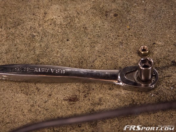 Next swap out the 12mm socket for the 14mm and remove the 2 bolts holding the starter to the transmission