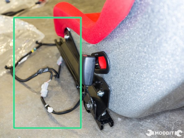 Depending on the side of the the seat, the seat belt wires may be really long or really short.