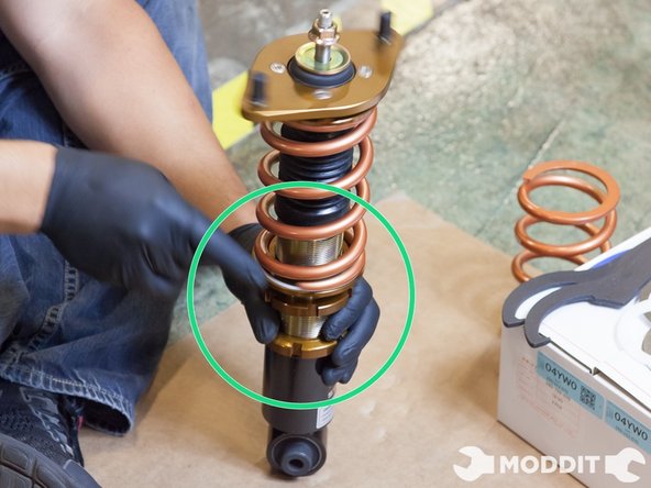 Finally, once our coilovers have been assembled, we picked an initial ride height by loosening the lowest collar &amp; spinning the housing as necessary. Make sure that the same is done for all sides in order to reduce changes once the coilvers are on the car.
