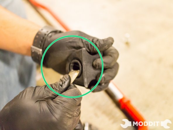 After once has removed the stock Front Sway Bar, our first step is to lubricate the included bushings with appropriate grease.