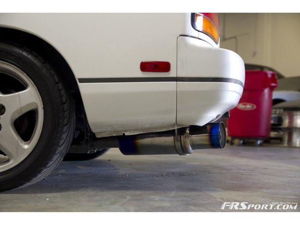 Here are some shots of the exhaust from outside the car after we lowered it from the jack stands.