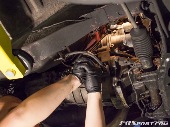 It doesn’t matter which one you take out first just remember that the shorter bolt is found towards the top of the starter/transmission and the longer bolt is located towards the bottom. These can sometimes be tightened very hard so you might want to apply some PB blaster before you attempt to remove them.