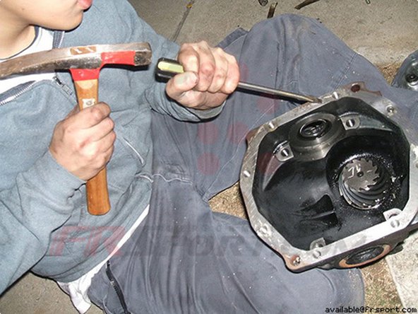 Step 5 With a hammer and flathead, chisel away the old gasket. I recommend to use a gasket scraper to avoid any seal failure or damage to the sealing area.