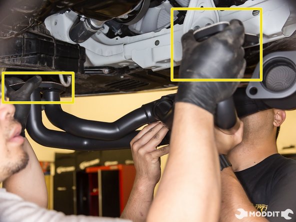 Now the tricky part with the header install is holding the gaskets in place while you lift the header to line up with the studs.