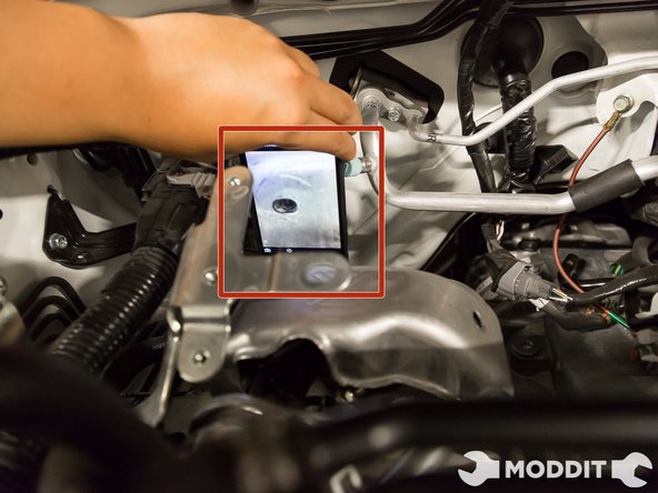 There is one bolt behind the turbo not easily seen or accessible. Please note the location in the picture; located using a cell phone camera