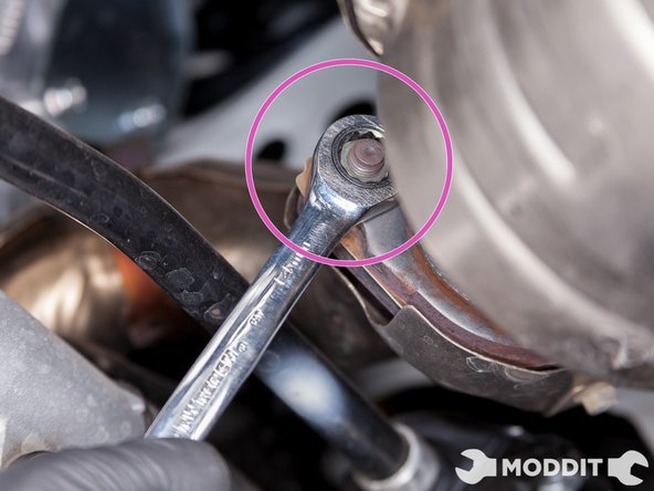 First step is to unbolt the nuts from the front pipe that connects to the cat back part of the exhaust. Keep these, as they will be reused later on.