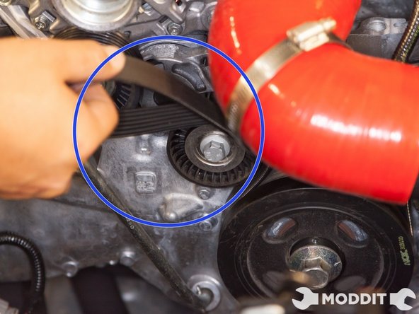 Although the belt is loose, do not remove it, as you do not want to forget the orientation of the belts.