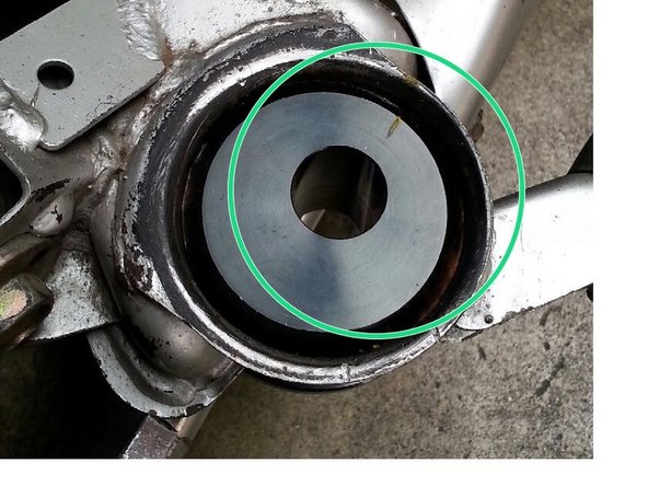 Using the bushing press kit, press each new solid subfame bushing into their respective hole.