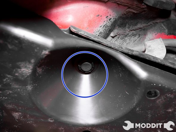 Push in some of the final plastic pins to completely secure this panel.