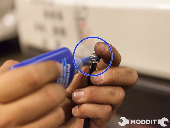 Apply blue thread locker to the set screw.