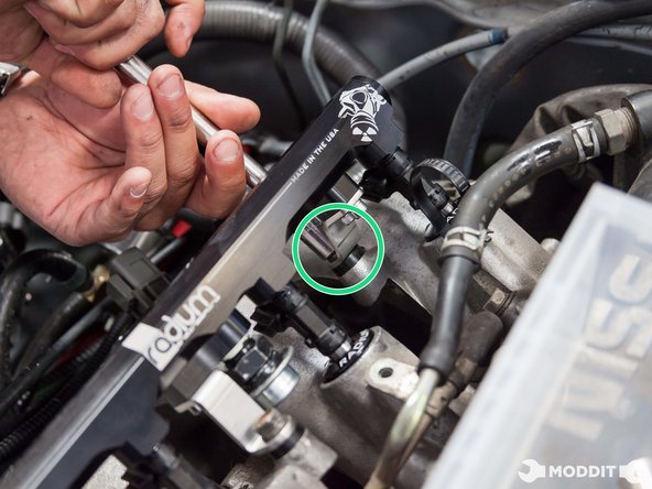 Be careful not to strip or over torque any of the bolts for the fuel rail.