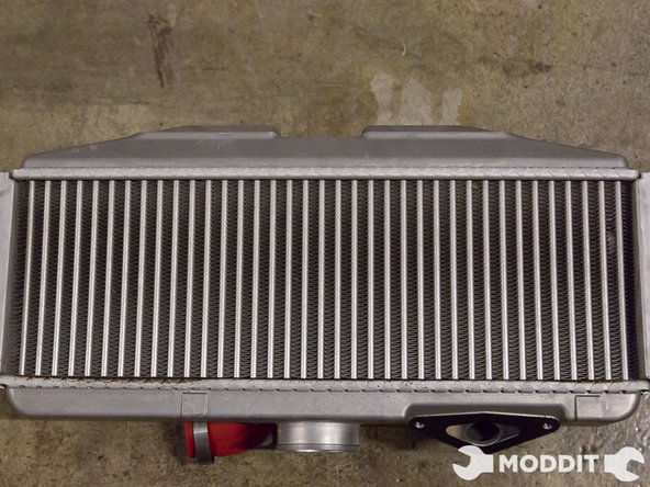 Carefully remove the intercooler some wiggling will be required