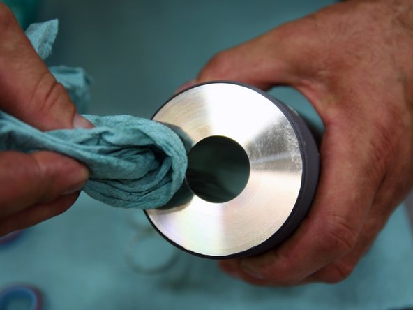 Repeat process with Scotch Brite to polish surface.