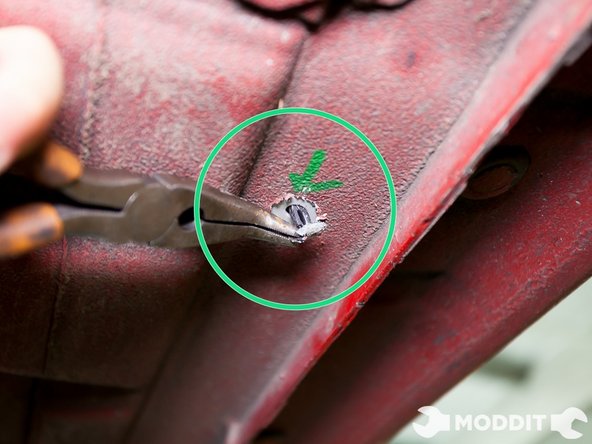 It is recommended to use a sharp, 45 degree pick to easily remove these clips. As you can see, the clips have been covered in factory sound dampening material and may be hard to lift with just your hands.