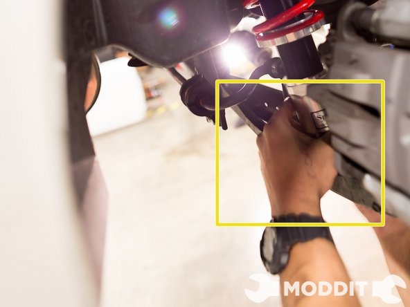 After you've removed all of the Stock shocks and springs, it is time to install the coilovers.