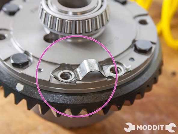 The reason being that we will not be able to re-use the thread locking tabs found in the OEM LSD. As you can see in the image, they do not clear the construciton of our OS Giken LSD. It is common knowledge however that they are not needed and one would be ok simply using the Loctite Thread Locking compound.