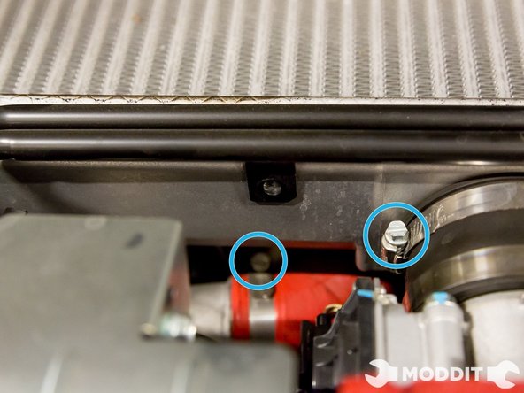 Loosen hose clamps on the silicone coupler for the Turbo and Throttle body