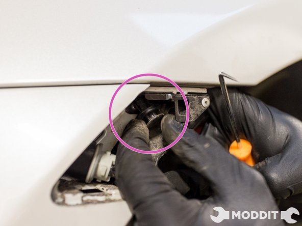 This clip secures the top part of the outside bumper to the bottom of the foremost fender section.