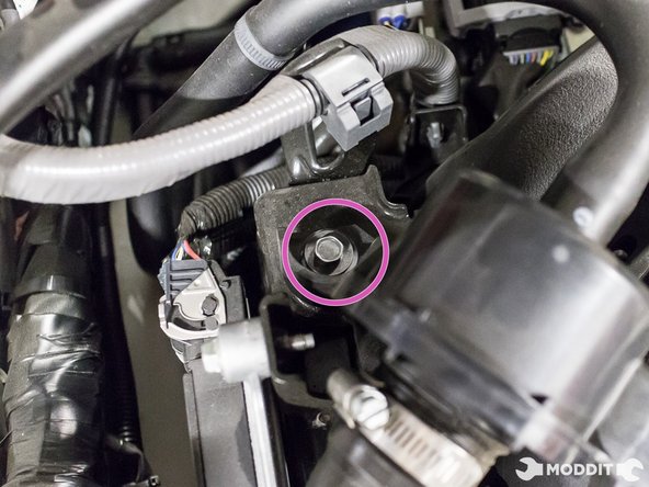 With the 10mm socket, remove the two bolts securing the sound generator tube.