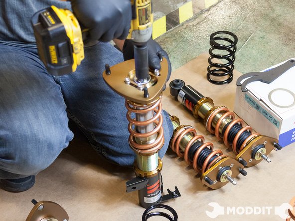 Upon reassembly, we tightened the collars back on until there was no play in the springs, then we tightened it one more turn. There are different preferences in setting preload so feel free to set it to your preferred setting.