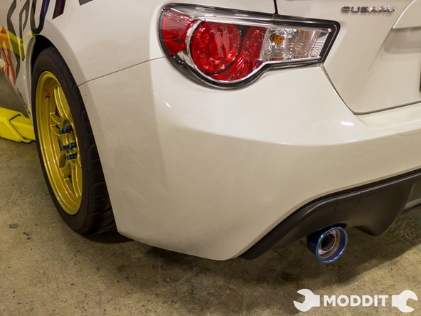 Get the car back on the ground, grab your favorite drink and admire the pretty rolled tip of the Tomei 60R exhaust.