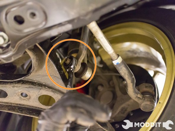 Once under trays are removed, disconnect the end links from the sway bar using a 17mm wrench.