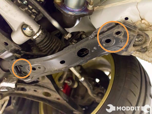 There should be bolts visible at both the ends of this bracket.