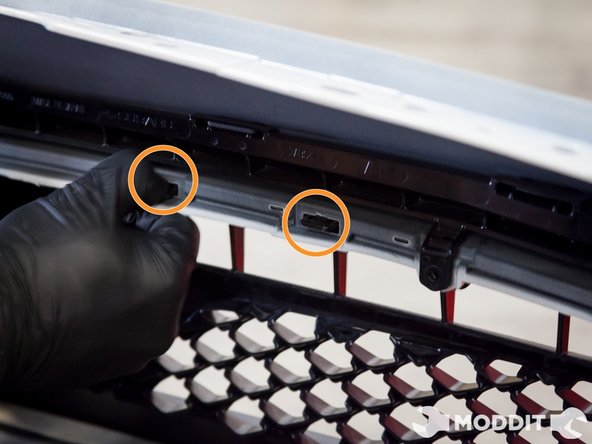 These tabs are very delicate and like to break when it is forced, so a nice and gentle use of the thumb will separate the tab from the bumper.