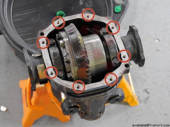 Placing the differential on 2 jack stands helps with removal of the cover and draining of the fluid.