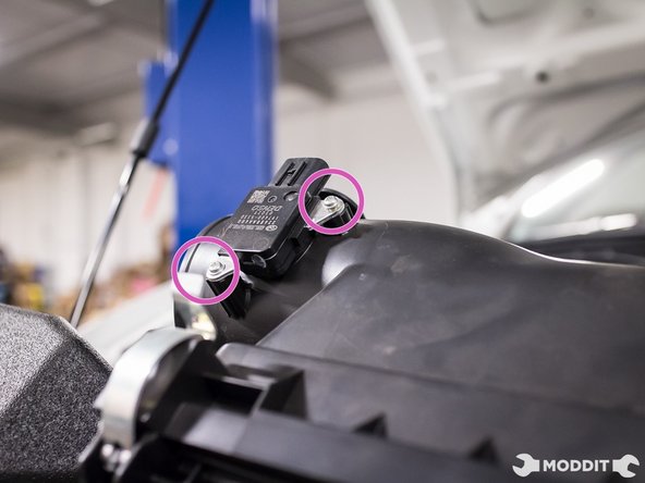 Now that the clamp to intake throttle body is loosen, rotate clockwise the Perrin intake tube and Perrin pipe to relieve the stress placed on the stock intake tube.