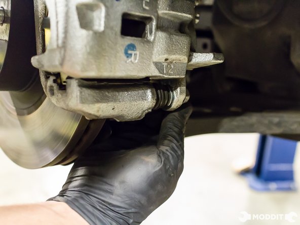 This will assist in holding the threaded sliding pin in place while you install the securing bolts.