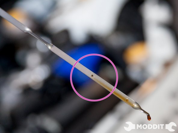 Once this was done we proceeded to adding the oil. The exact amount used for the oil change was  5.4L or 5.7 U.S. Quarts. Make sure you use a funnel as it clearly helps in keeping things clean.