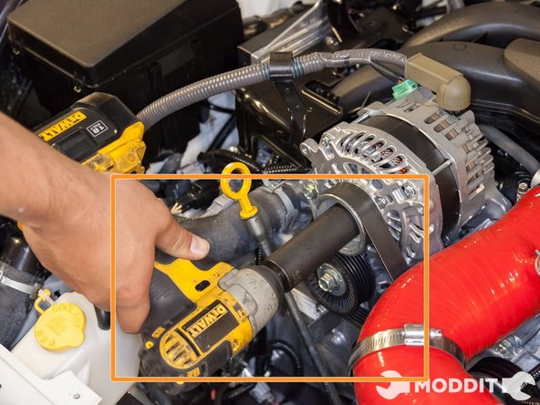 It is advised to use an Impact Gun for the alternator pulley removal because there is no other way to hold the pulley from spinning. The torque from the impact gun will remove the nut from the alternator without spinning it.