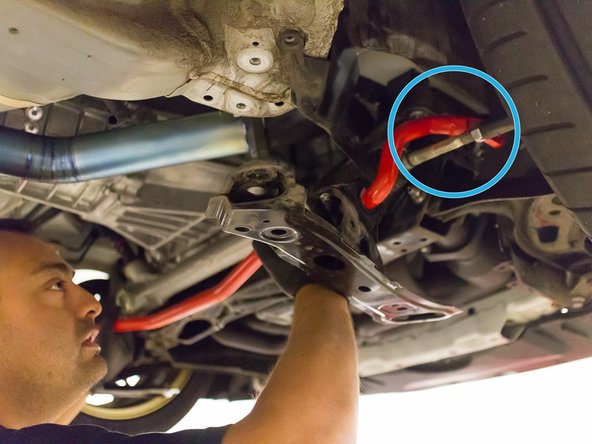 When installing the sway bar, hook the sway bar ends over the tie rods and attach the end link to hold the bar.